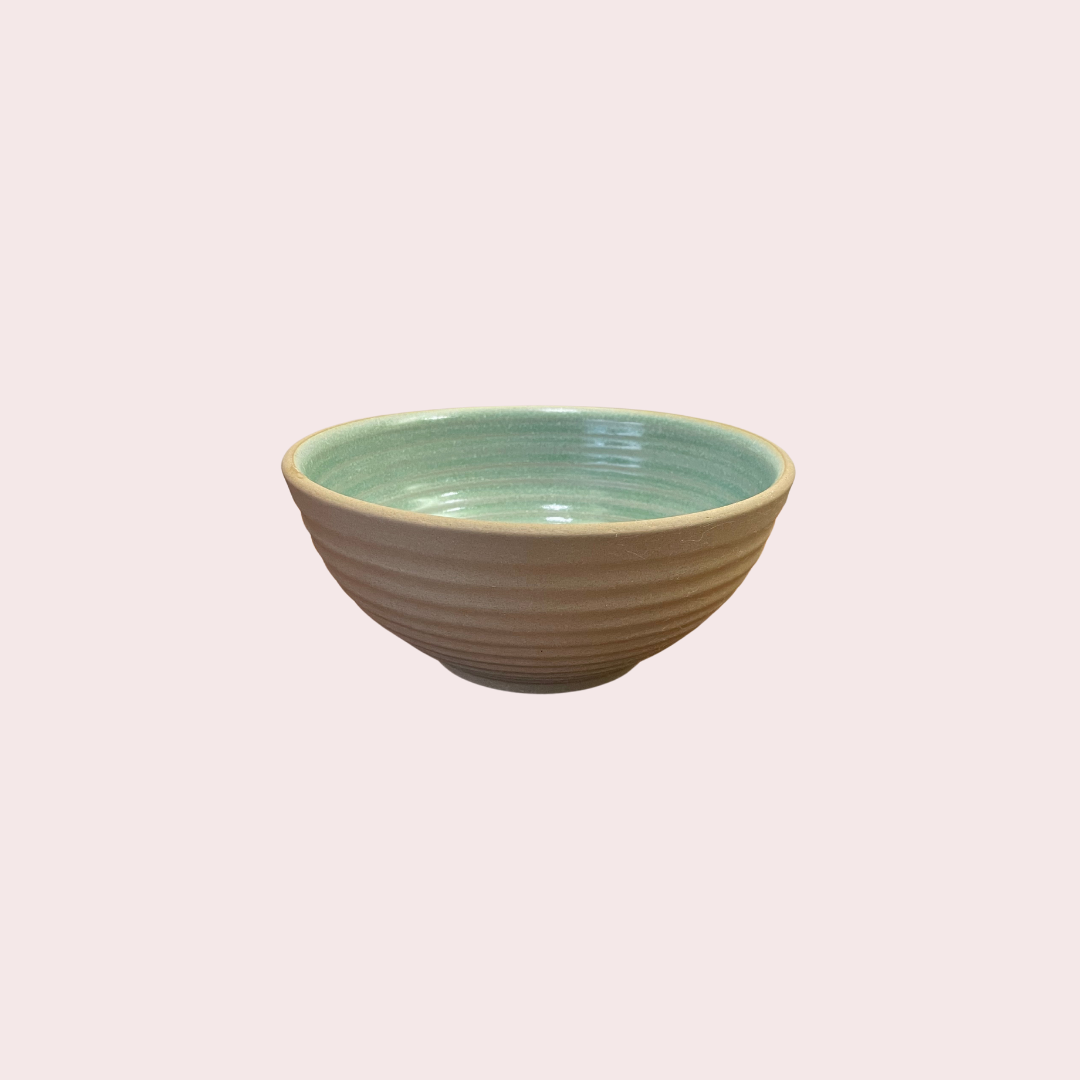 A large ceramic bowl with brown stoneware finish outside and green glaze inside. Buy kitchenware in Bangalore.